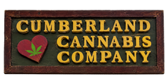 Cumberland Cannabis Co. logo with green, gold, and red hexagonal badge and cannabis leaf emblem
