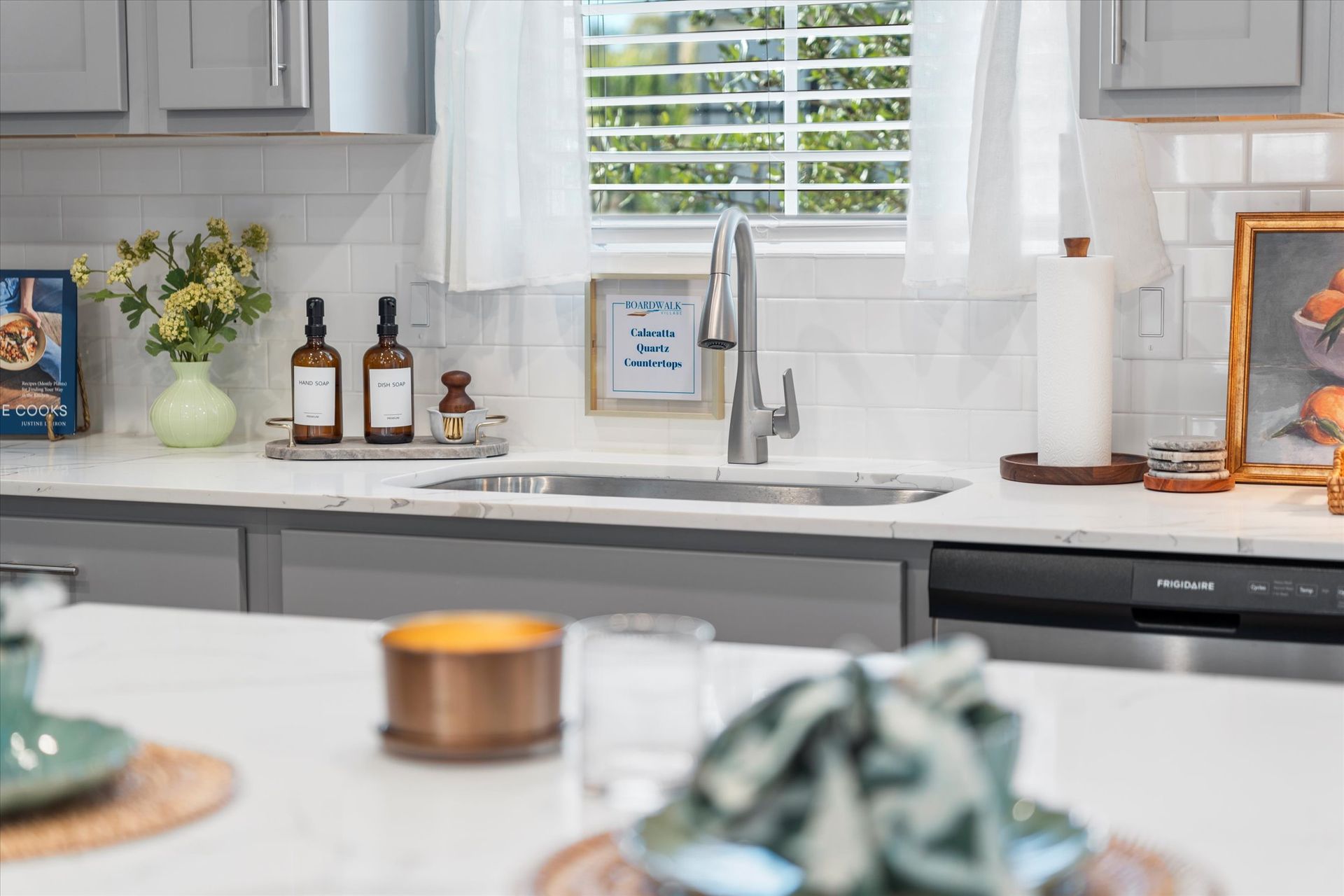 Modern apartment kitchen at Boardwalk Village in Conroe, TX