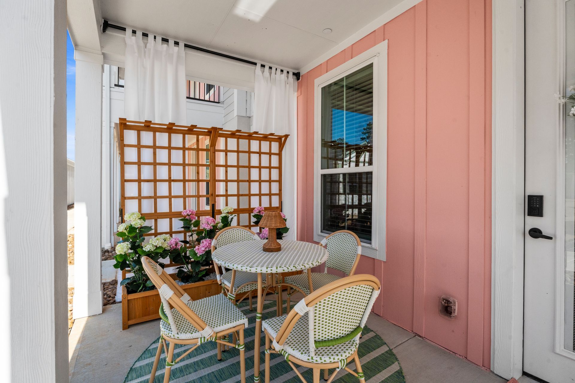 Private patio at a cottage-style rental home at Boardwalk Village in Conroe, TX