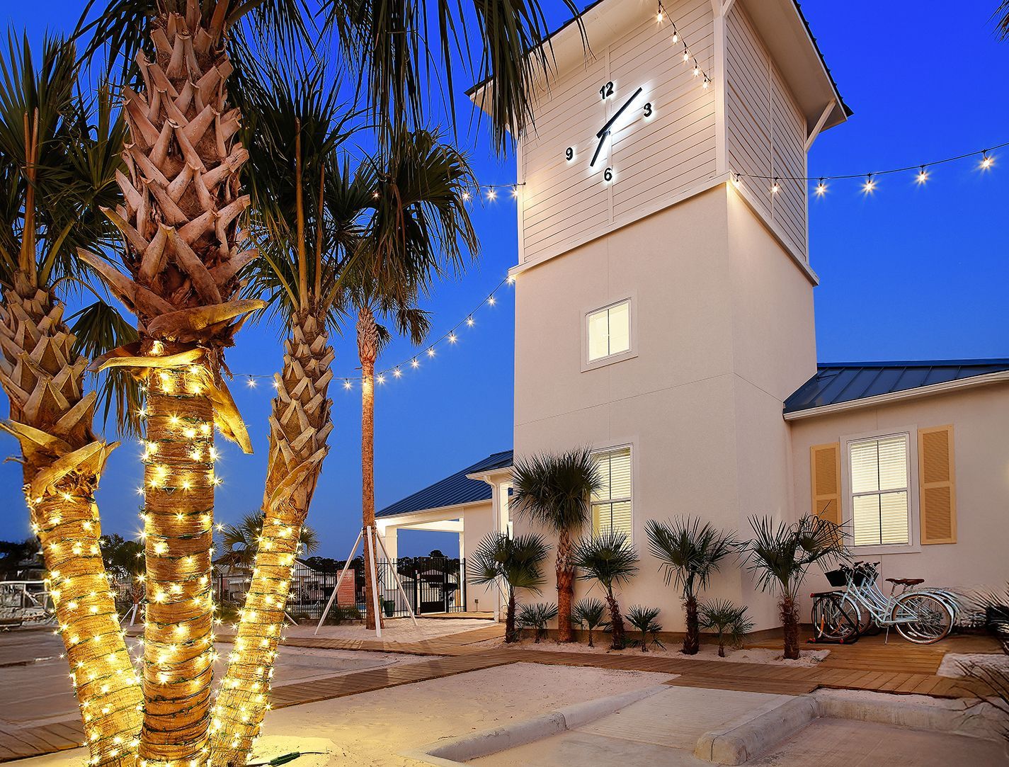 Boardwalk Village community entrance at sunset