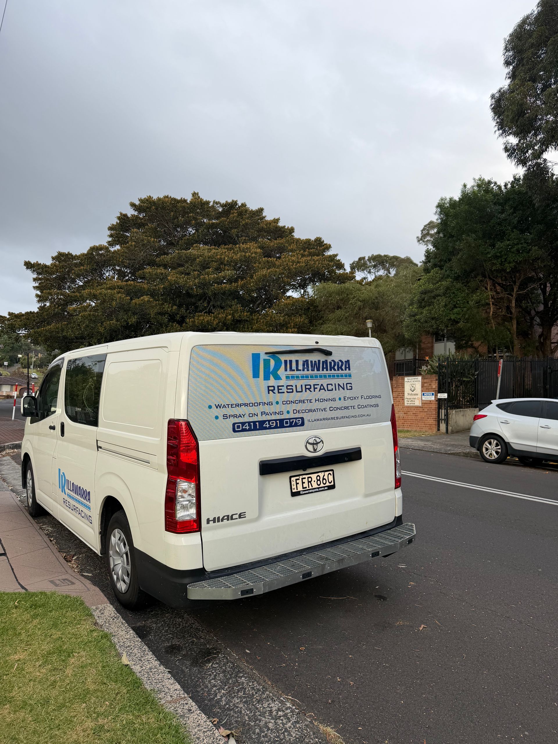 Surface Preparation with Tools in Front of a House — Illawarra Resurfacing Pty Ltd in Balgownie, NSW