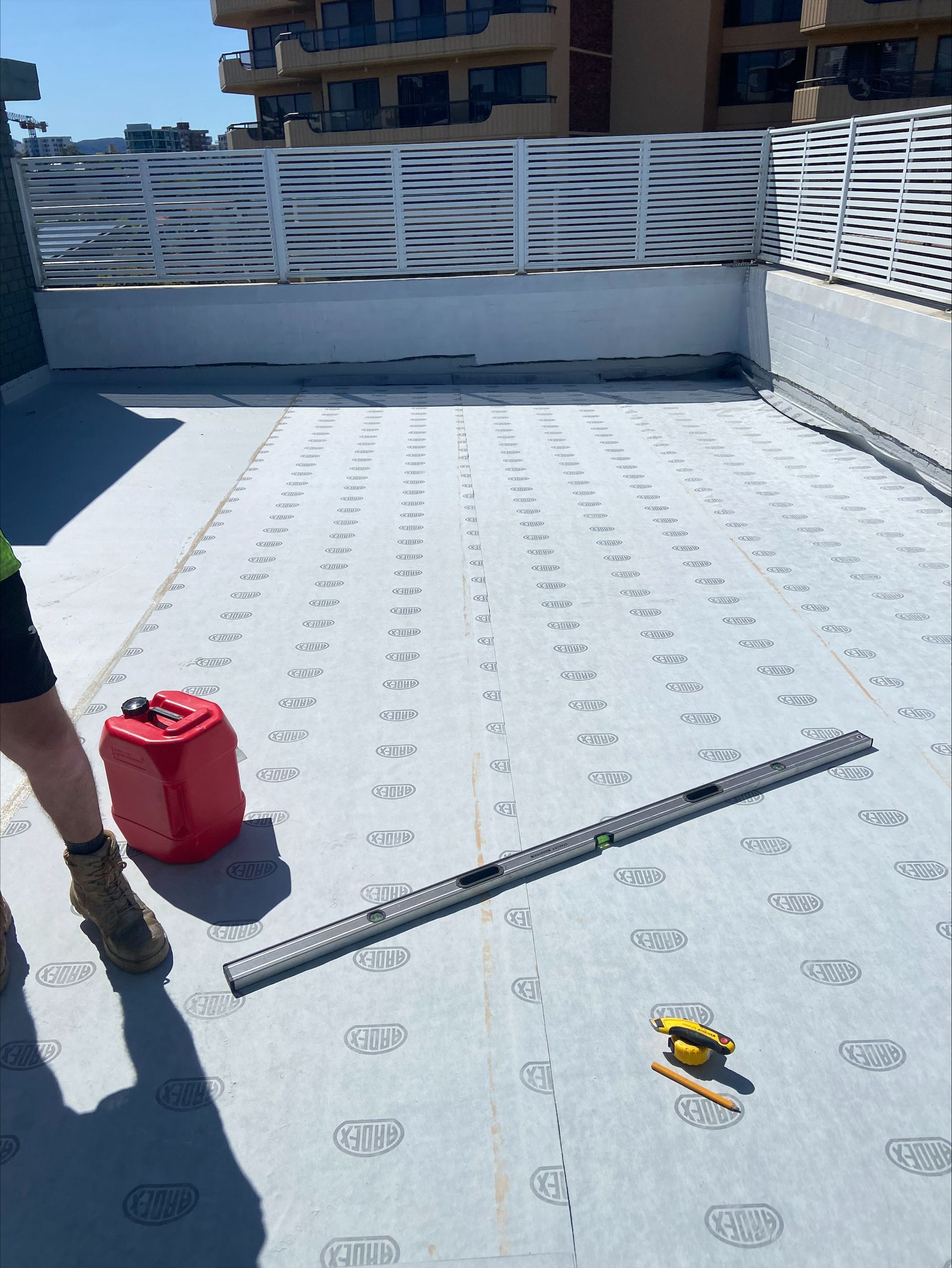 Setting Up Waterproofing on a Balcony — Illawarra Resurfacing Pty Ltd in Balgownie, NSW