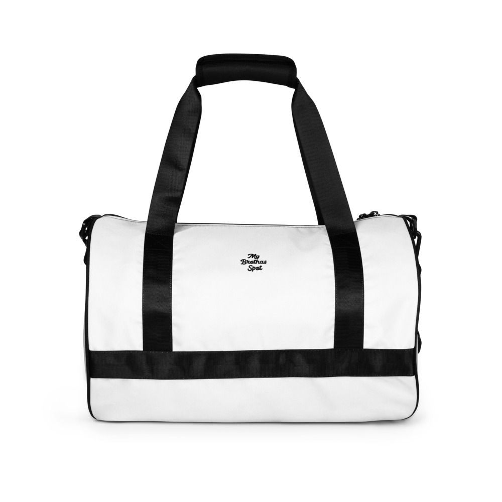 White and black duffel bag with long shoulder straps and zipper accents