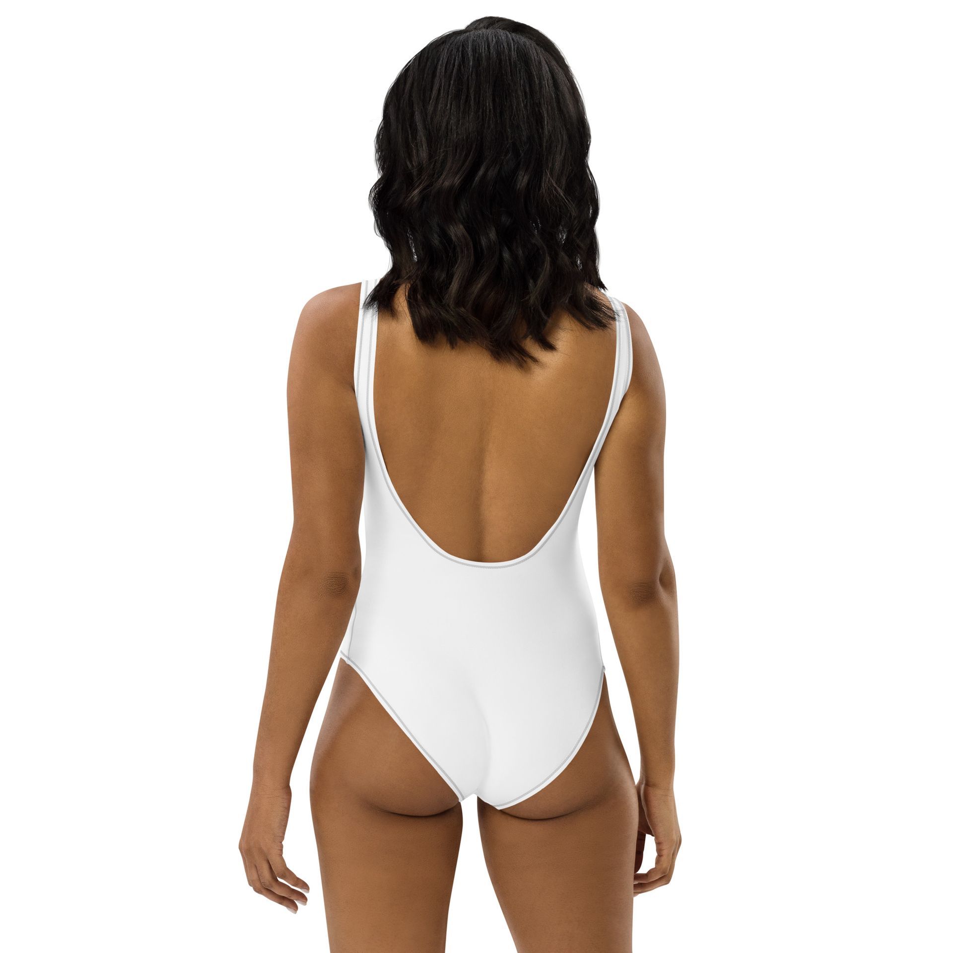 Woman in white one-piece swimsuit with “My Birthday Spot” text, standing against a white background