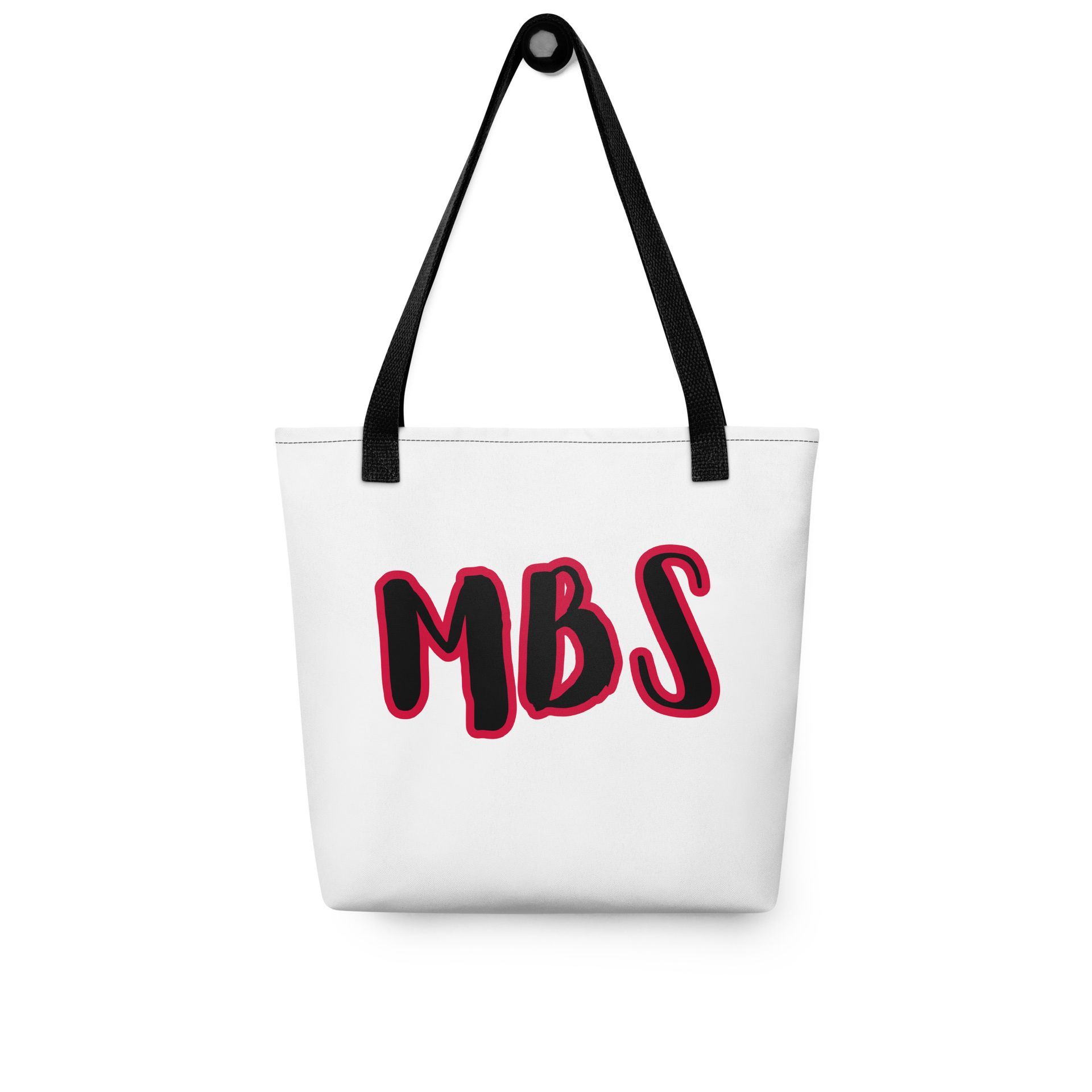 White tote bag with black handles and red “MBS” lettering on a plain background