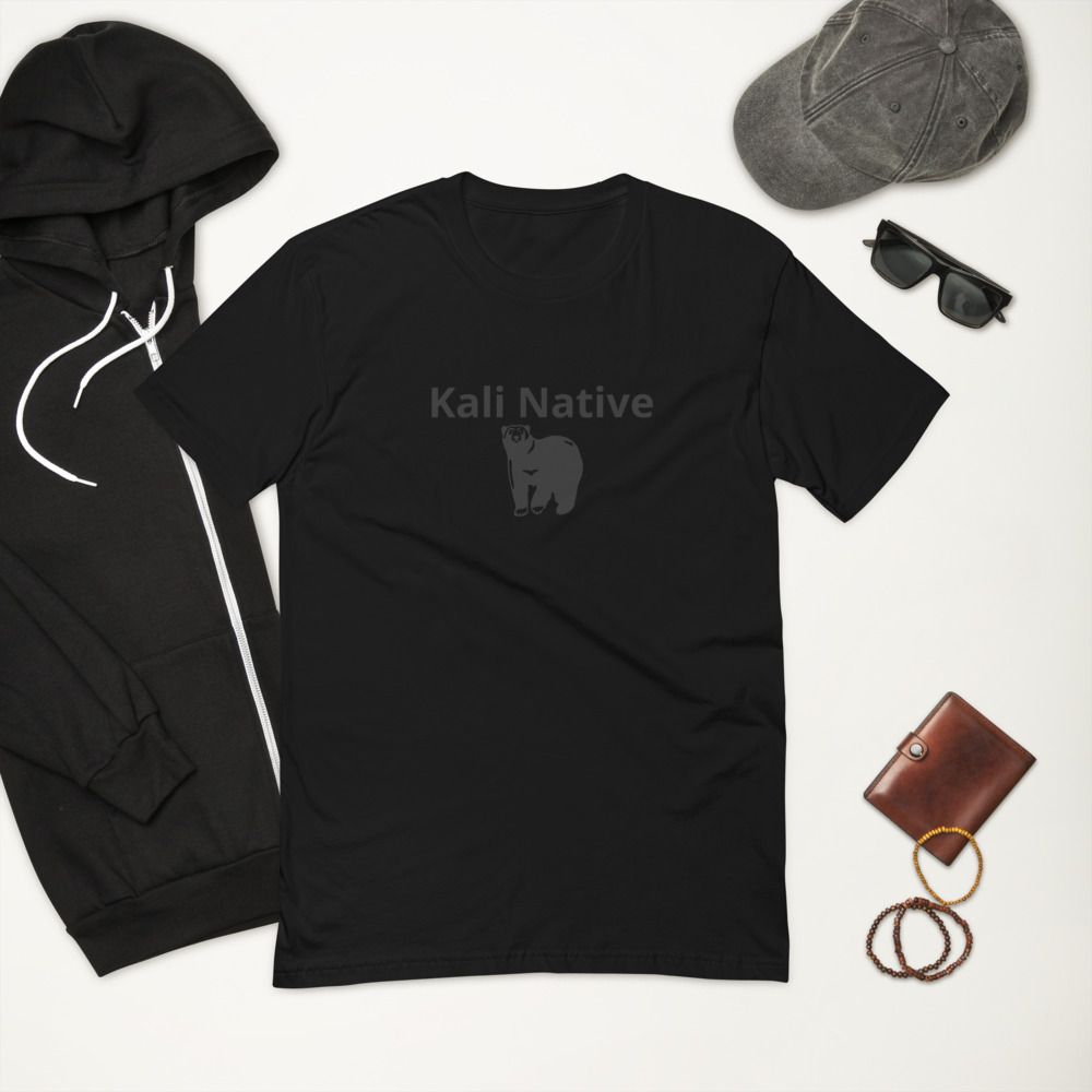 Black T-shirt with “Kali Native” logo, hoodie, cap, sunglasses, wallet, and bracelets on a white background