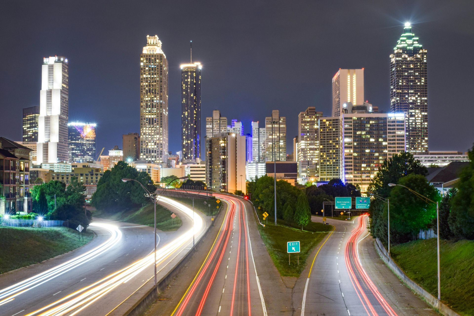 A highway going through a city at night