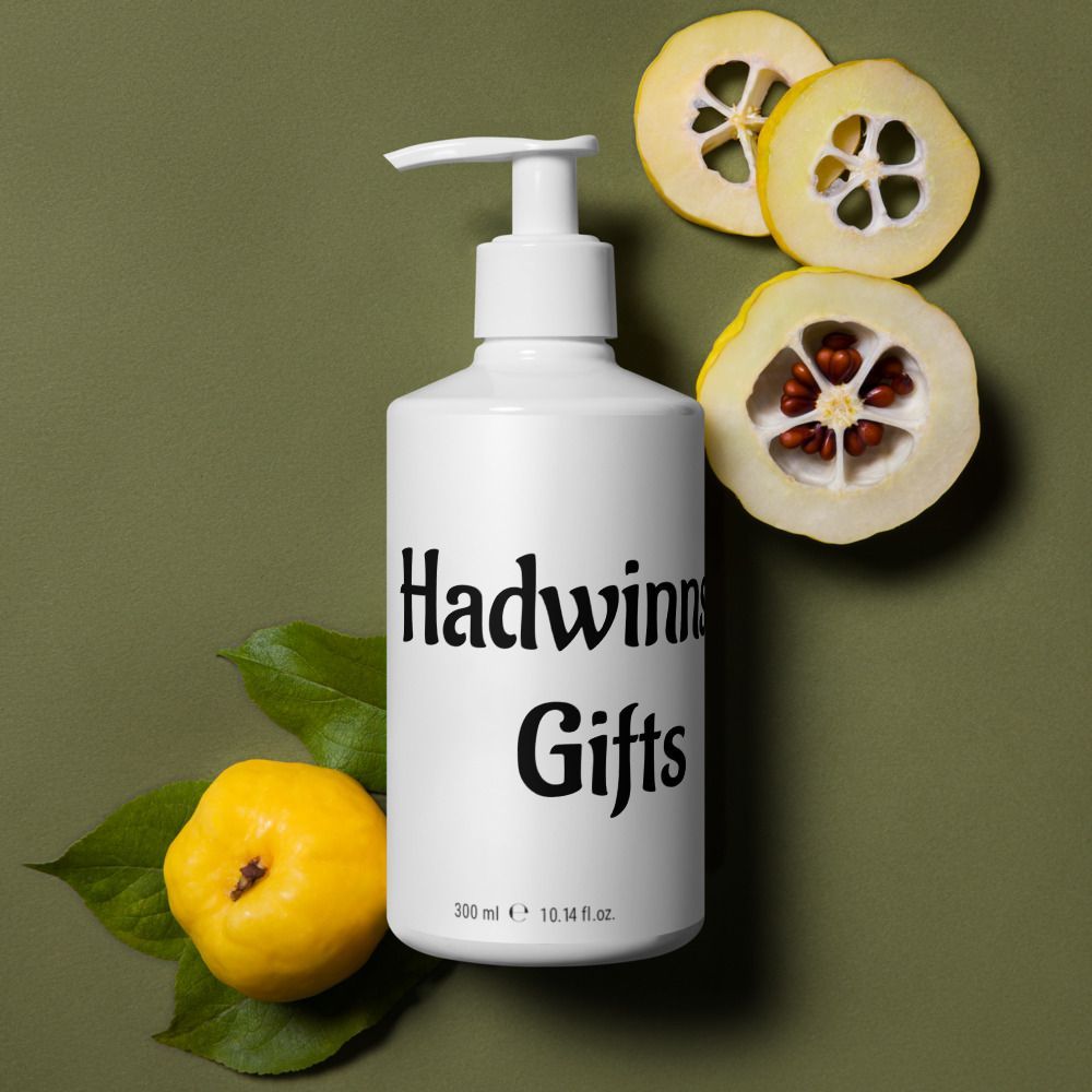 White bottle labeled “Hadwin Gifts” with a pump, surrounded by yellow fruit slices and leaves on an olive background