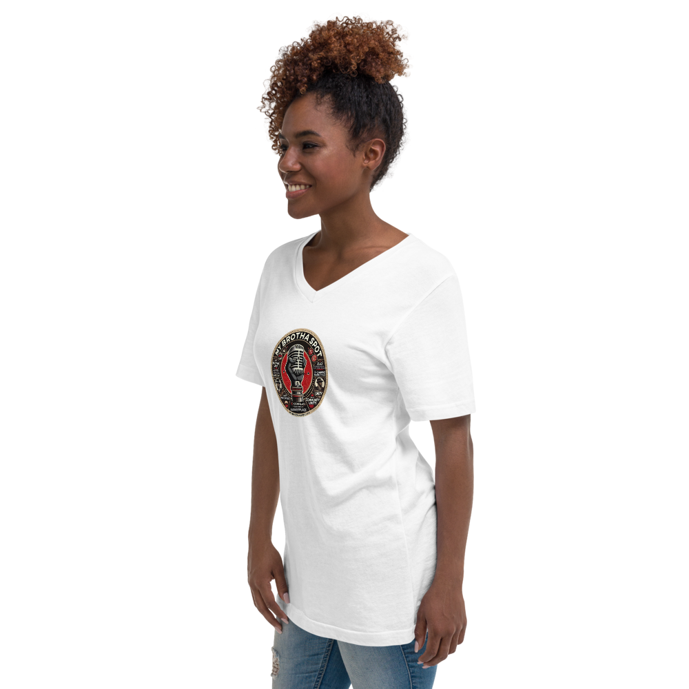 Person wearing a white V-neck T-shirt with a circular graphic, standing against a white background