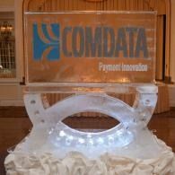 COMDATA logo etched in clear acrylic on a glowing white ice sculpture