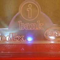IBank sign with illuminated blue light and red base, showing partial “dex” and “MS” logos