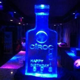 Blue-lit CÎROC bottle display with “Happy Birthday” on a nightclub table
