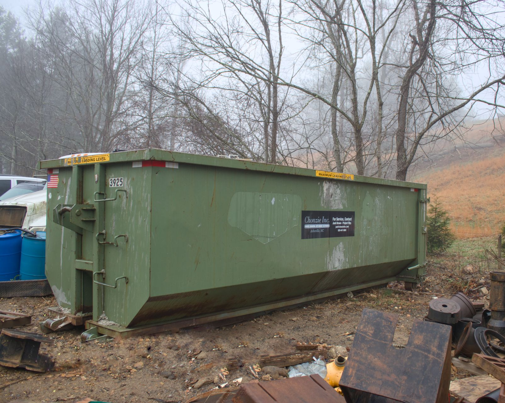 Chonzie Inc Green Dumpster rental. rent a dumpster for a day. Same day dumpster service. Waste management.