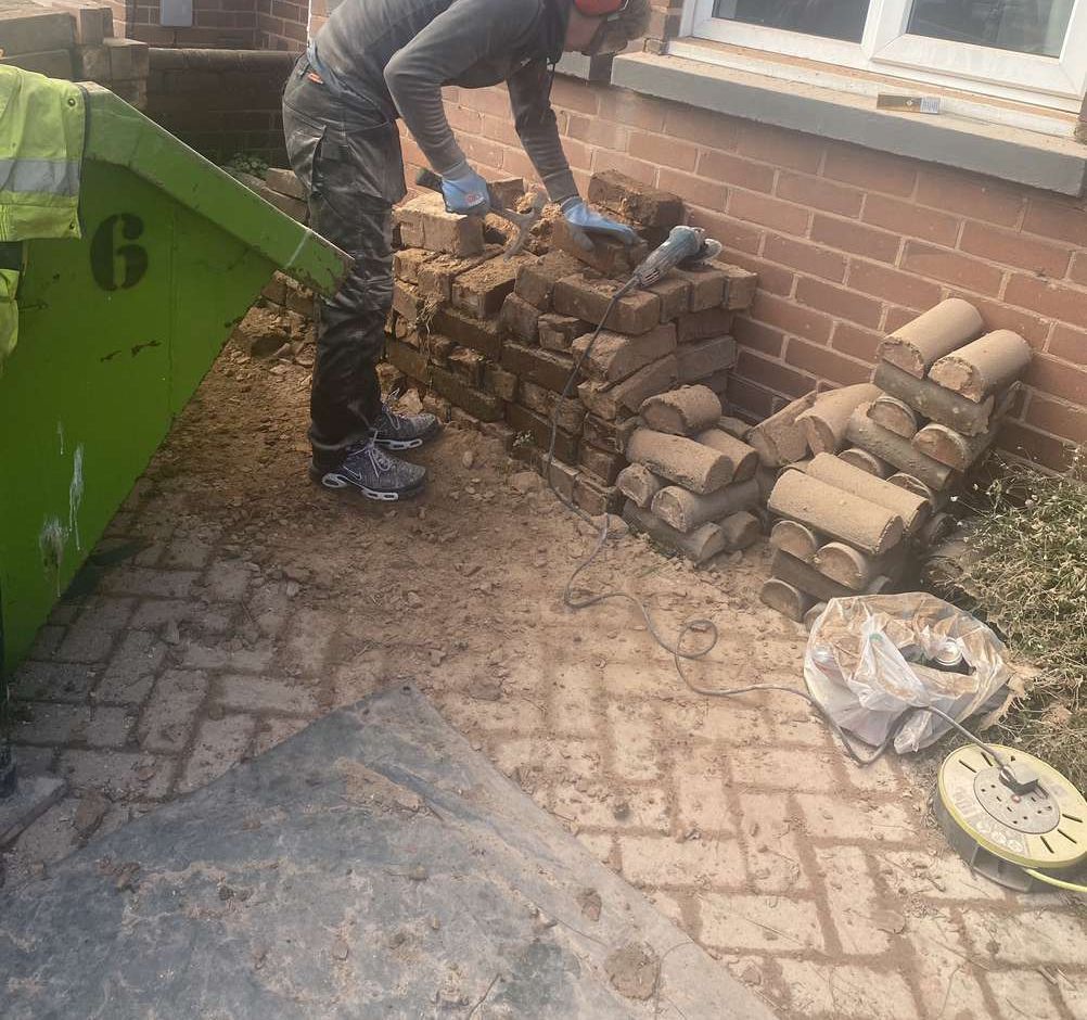 Dyl restoring a wall Brick work repairs and re-pointing with restored bricks