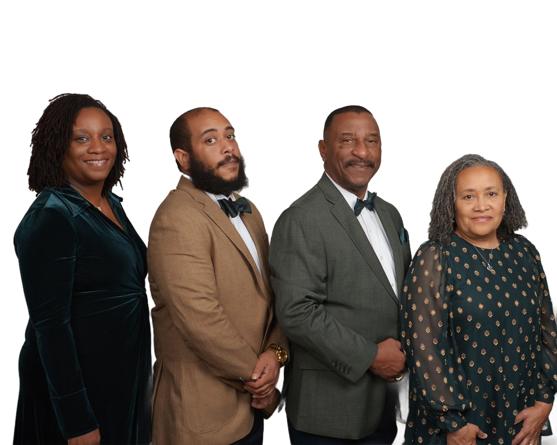 Four people standing together in formal attire against a white background, posing for a group portrait.