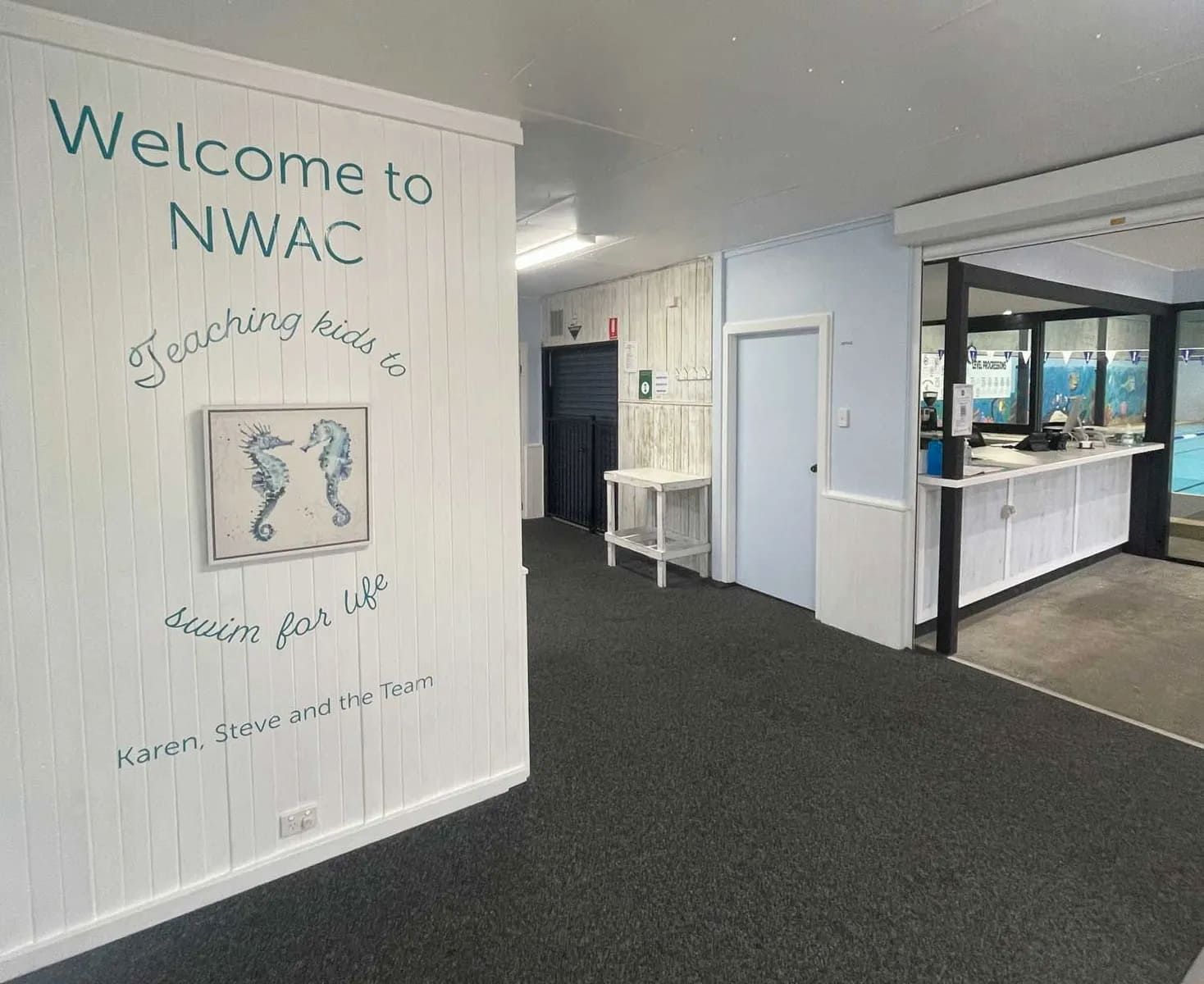 Welcome Sign for Nwac in a Bright Office Lobby With Counters and a Hallway — North Wyong Aqua Centre in Wyong, NSW