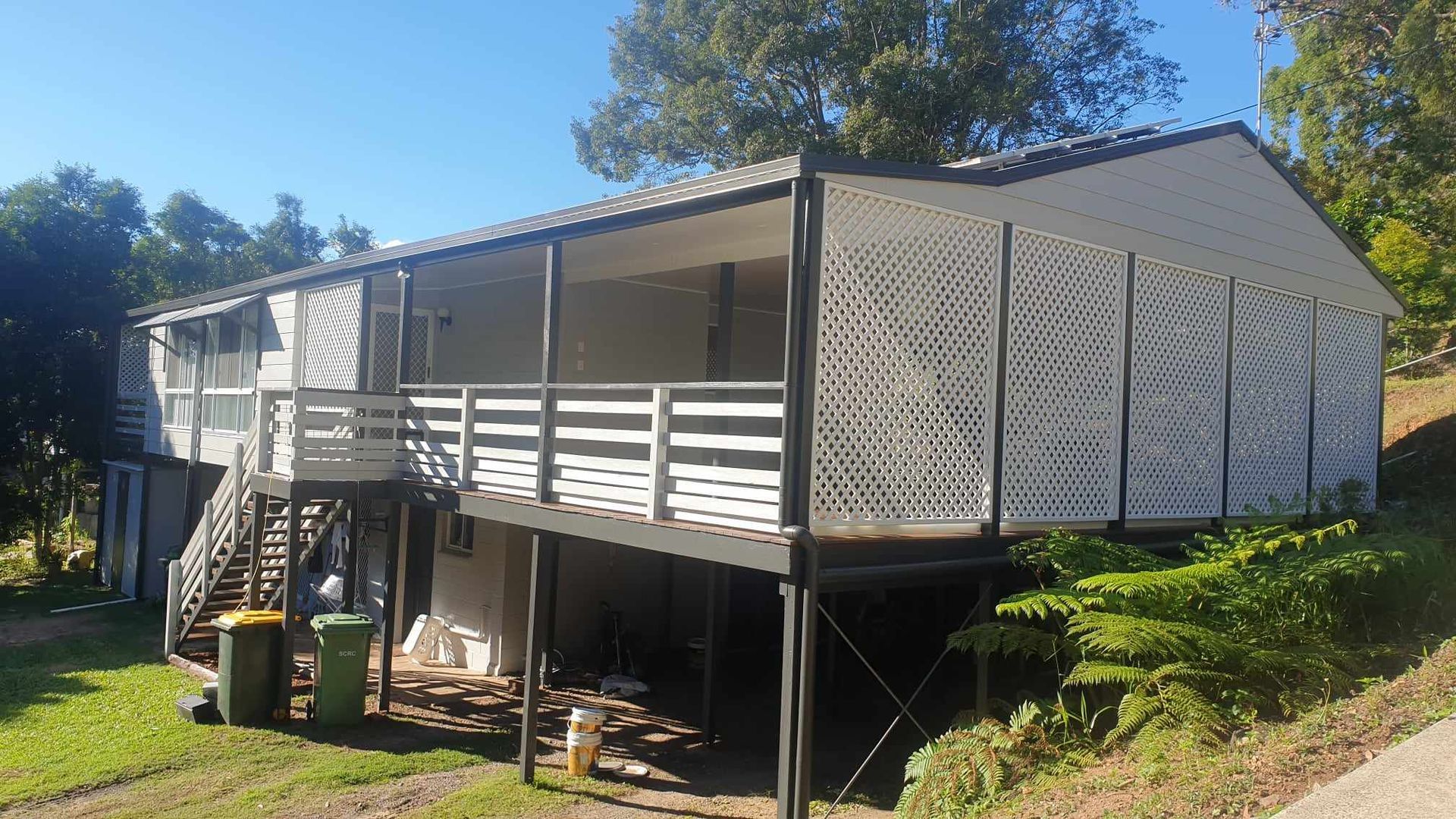 A white house with a balcony and stairs — Painter In Sunshine Coast, QLD