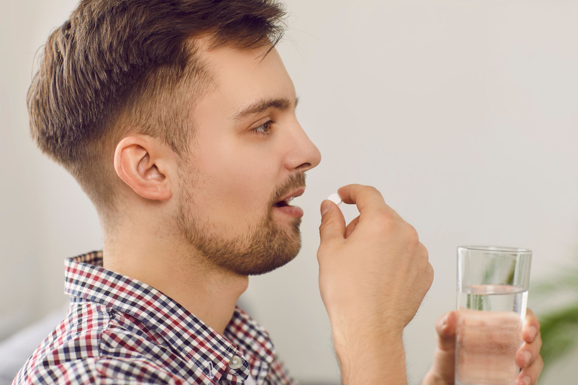A Man Taking Medicine