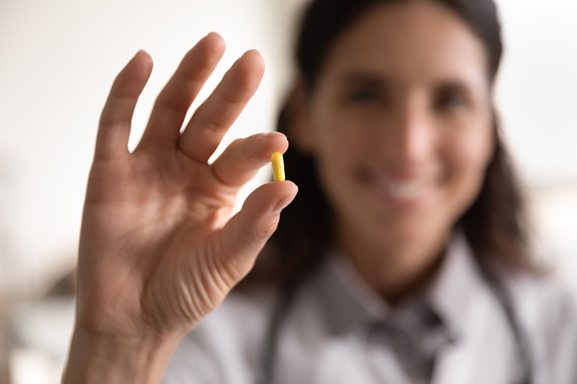 Doctor Holding a Medicine