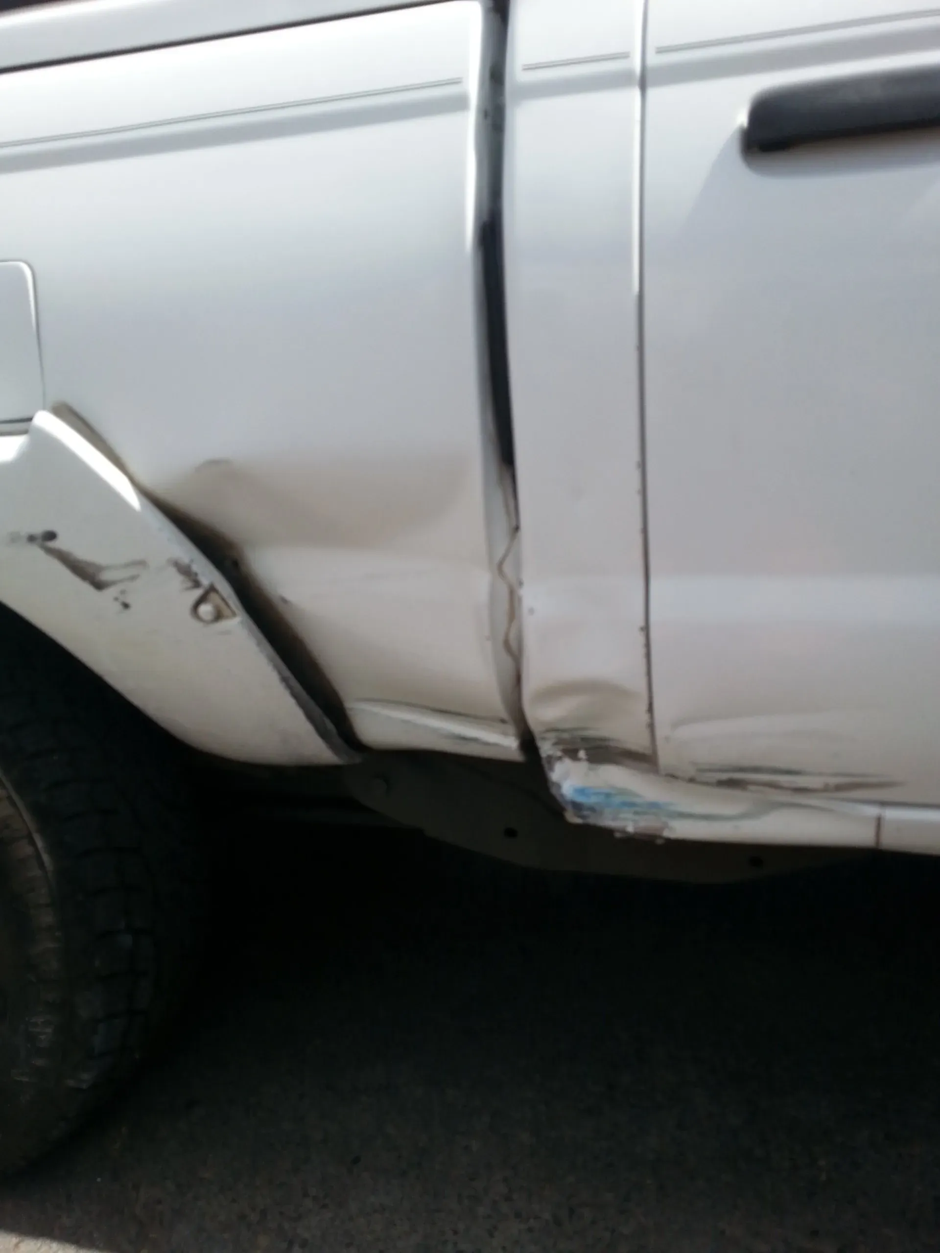 White Car Damage — McMinnville, OR — Marshall Auto Body