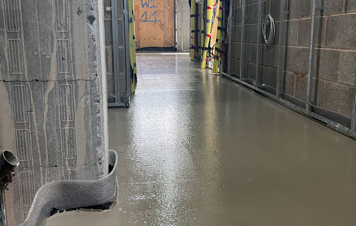 screed flor just dried in commercial corridor