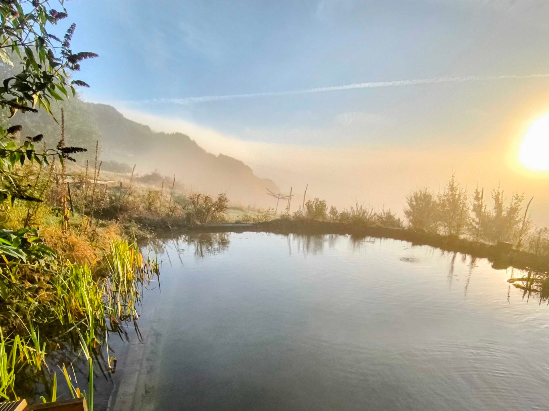 Natural pool, misty valley