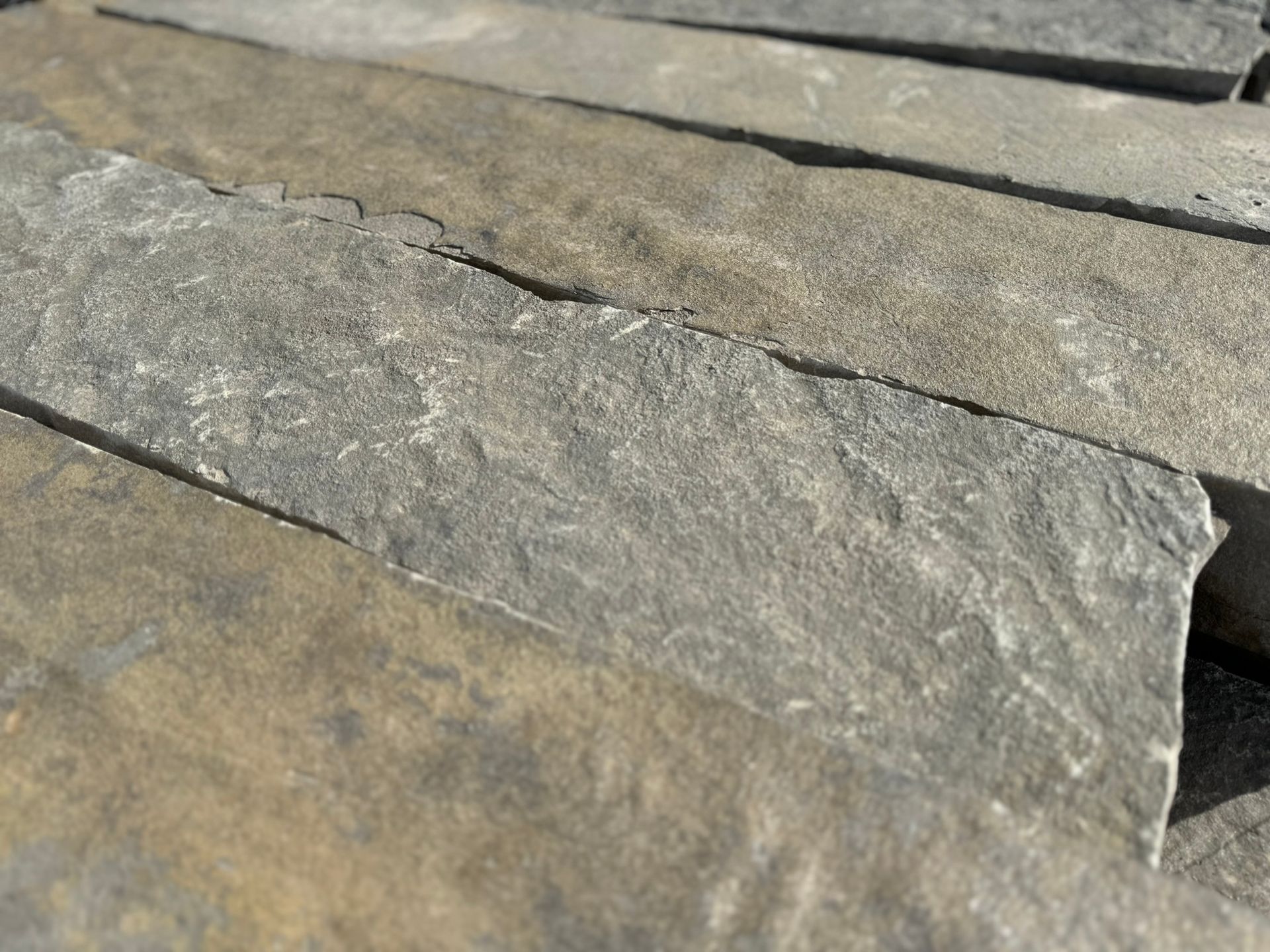 A close up of a pile of rocks sitting on top of each other.