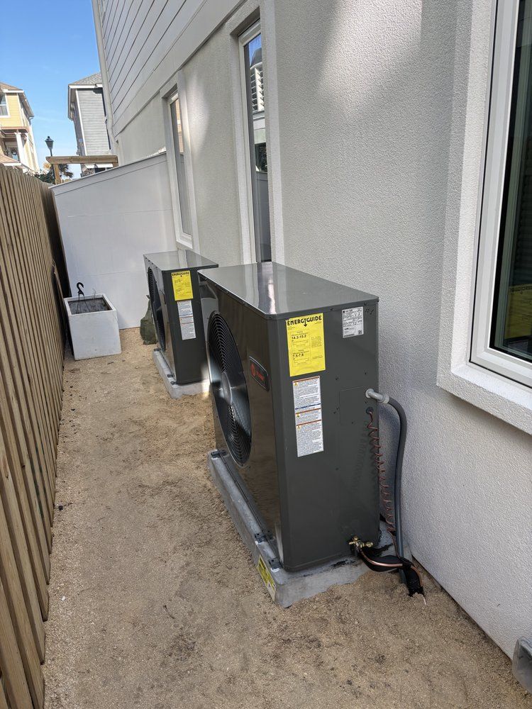 Outdoor Trane HVAC units installed for efficient home heating and cooling