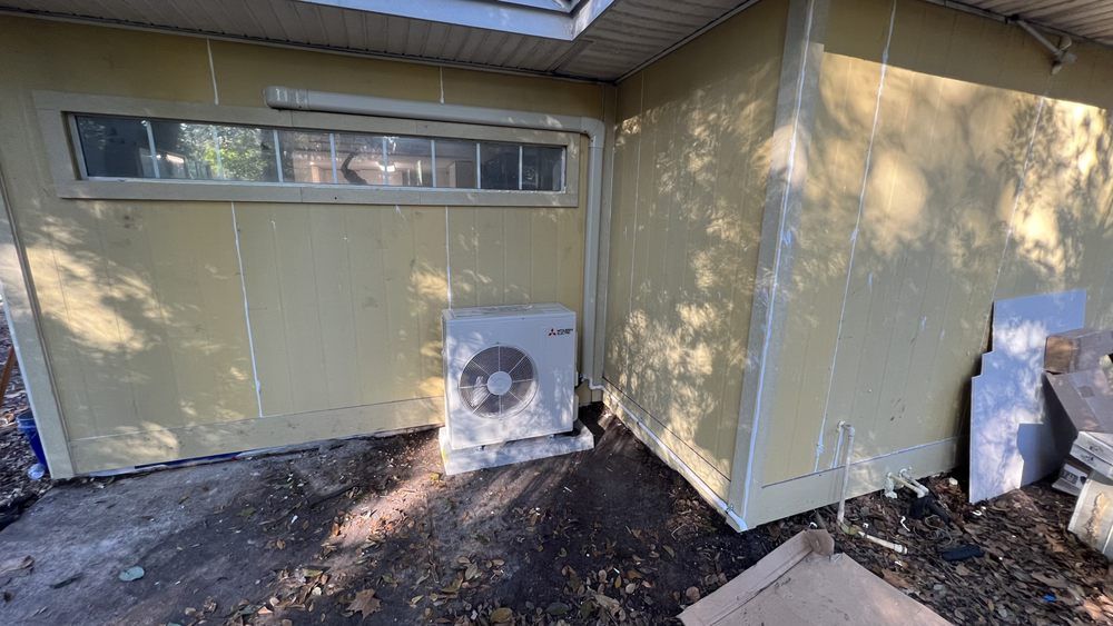 Mitsubishi mini-split AC unit installed for zoned cooling efficiency