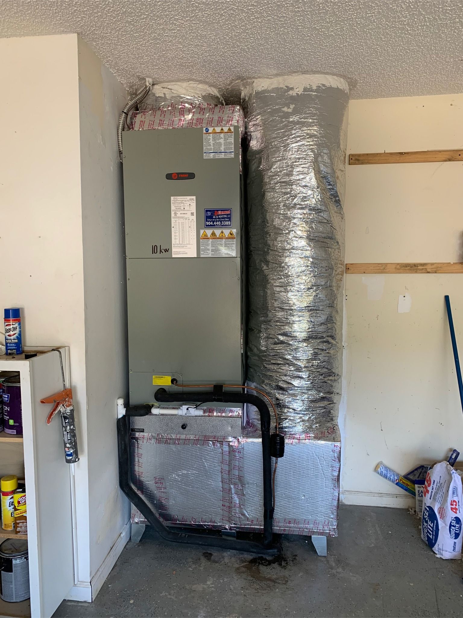 HVAC technician performing rooftop air conditioning system maintenance