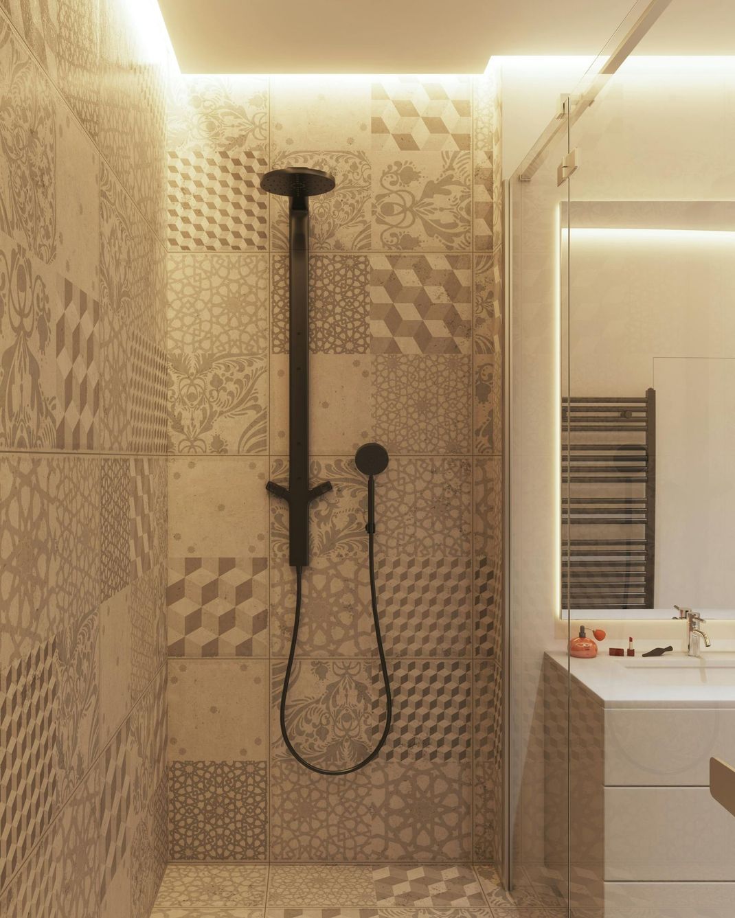 Shower with patterned beige and gray tiles, black shower head and handle, and a minimalist vanity.