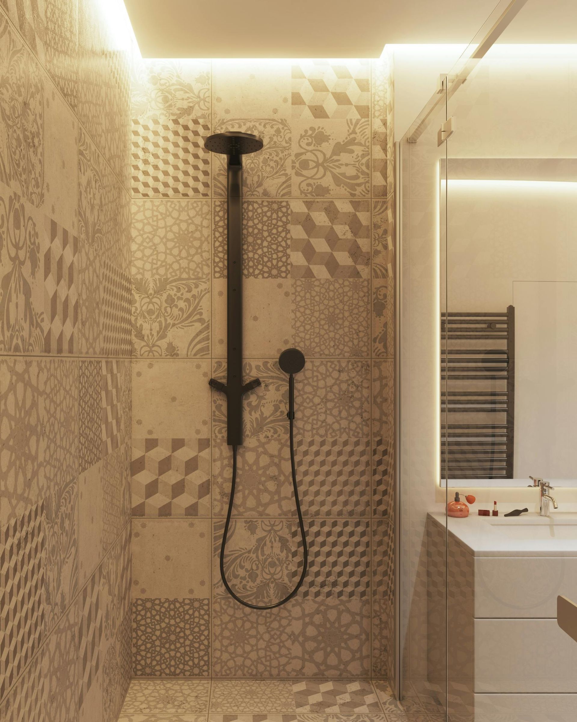 Shower with patterned beige and gray tiles, black shower head and handle, and a minimalist vanity.