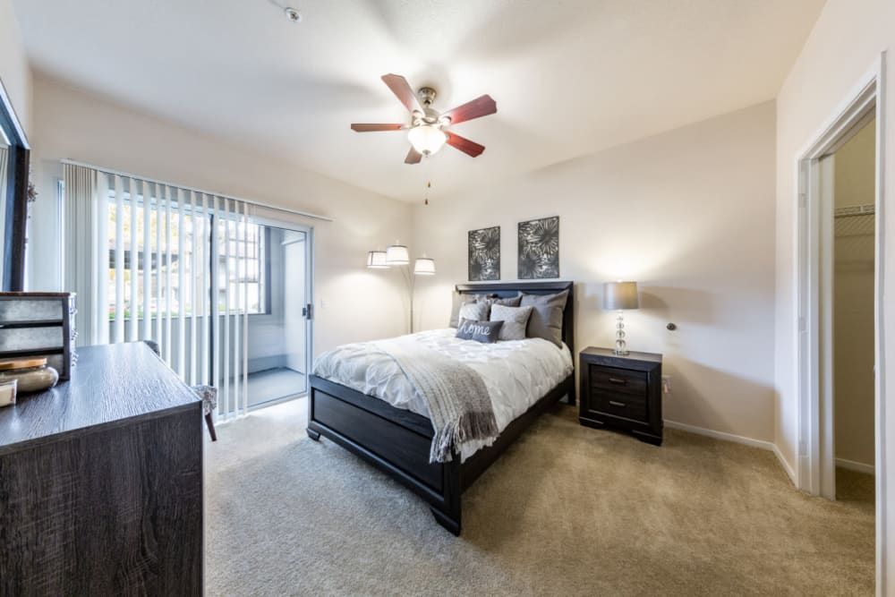 Spacious Bedroom with Ceiling Fans at The Fairmont at Willow Creek