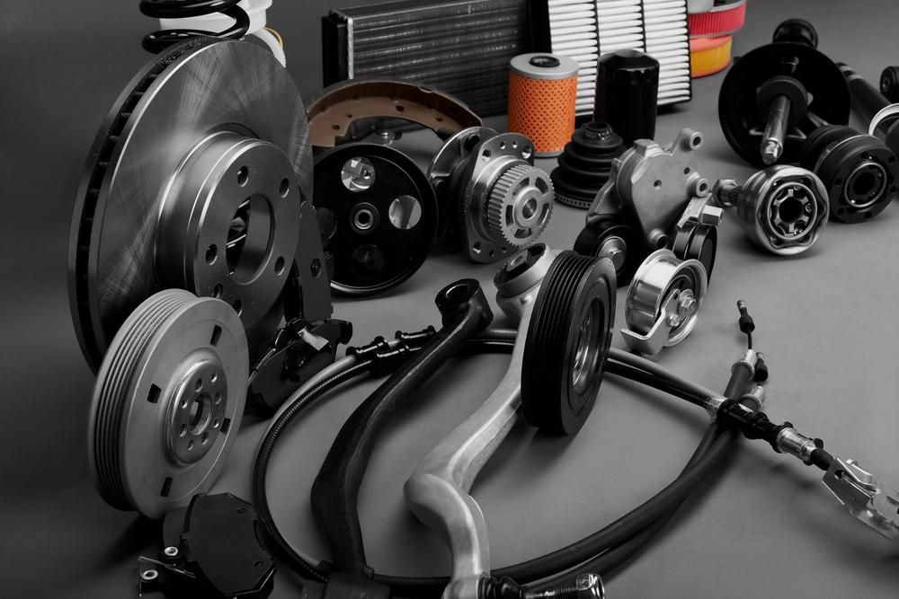 A Bunch of Car Parts Are Sitting on a Table — Ballina Bearing Supplies In Ballina, NSW