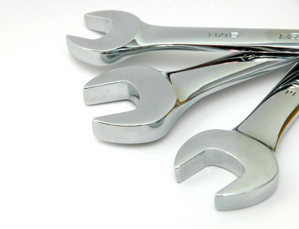 A Bunch of Chrome Wrenches Are Stacked on Top of Each Other — Ballina Bearing Supplies In Lismore, NSW