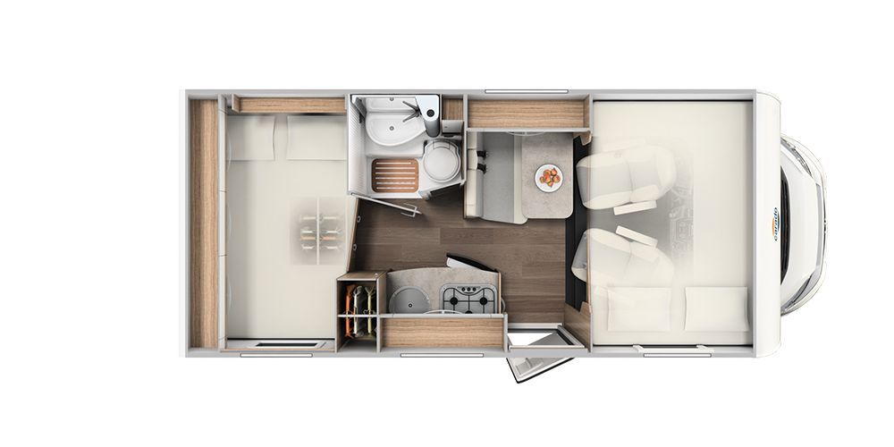 A floor plan of a camper van with a bed , sink , and stairs.
