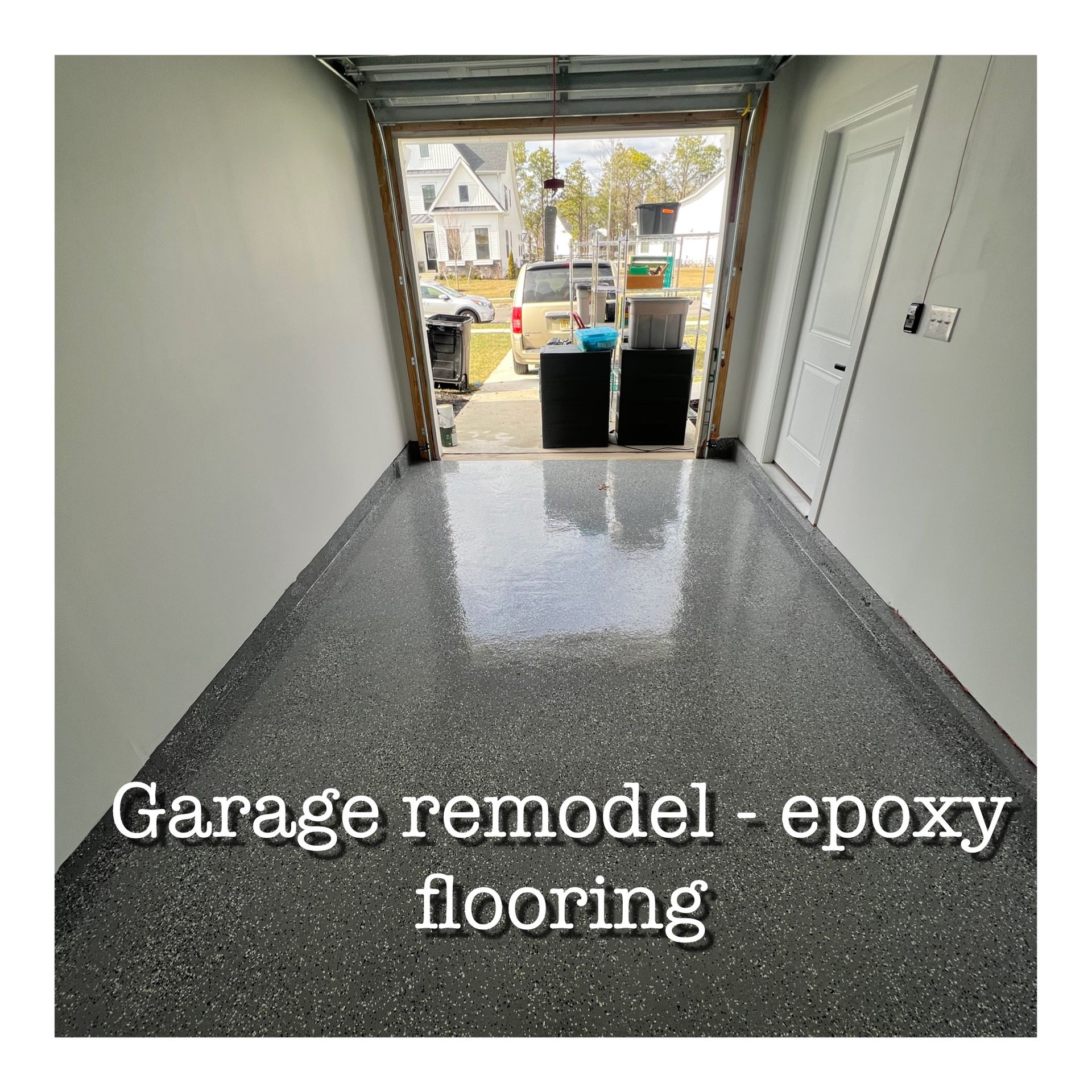 A picture of a garage remodel with epoxy flooring