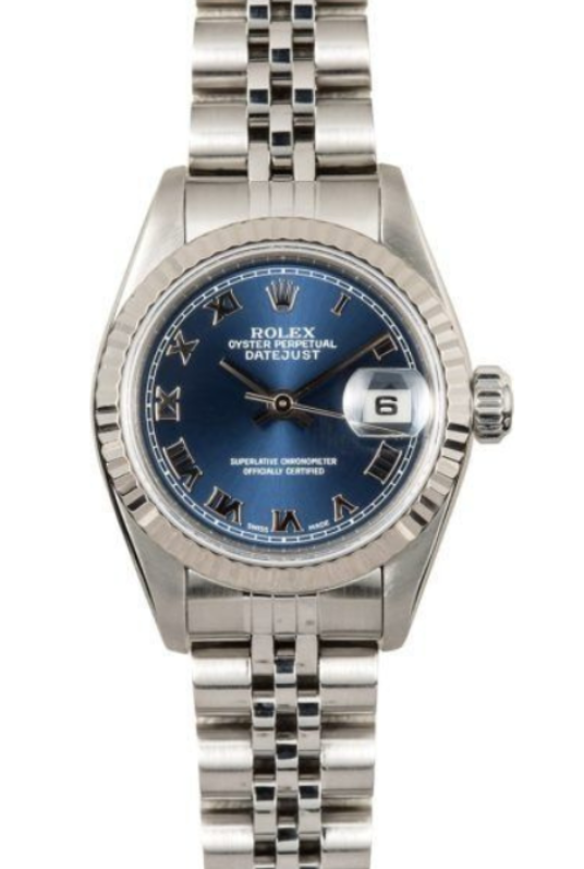 Silver wristwatch with blue dial and date display on a metal link bracelet