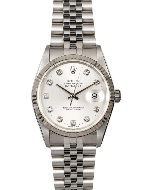 Silver wristwatch with white face and metal bracelet, showing diamond hour markers and date window