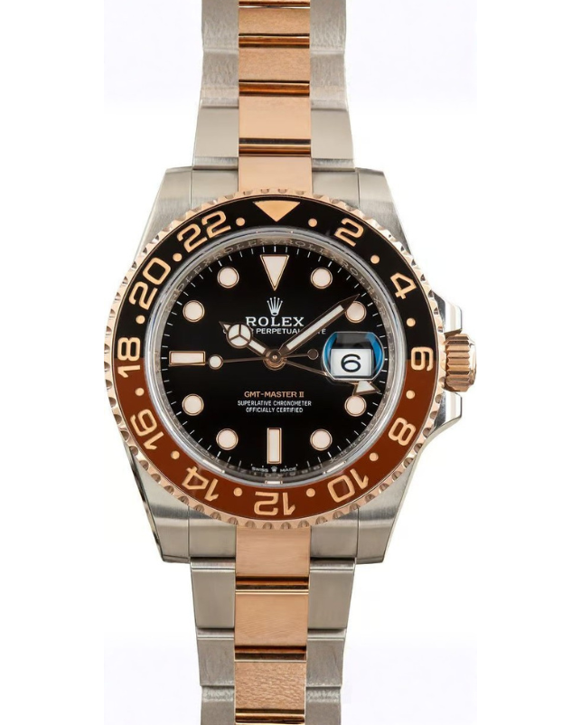 Gold Rolex-style watch with black face and gold bezel on a white background