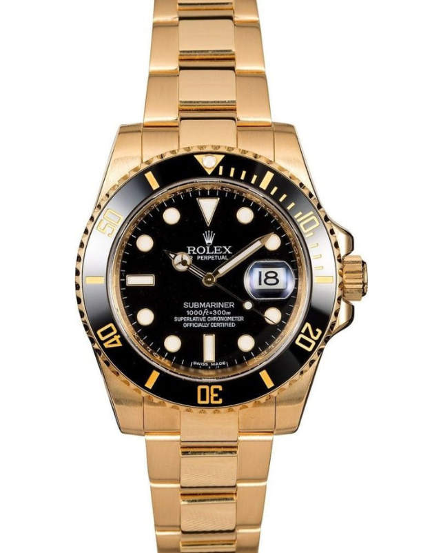 Gold Rolex Submariner watch with black dial and bezel, displaying date at 3 o’clock