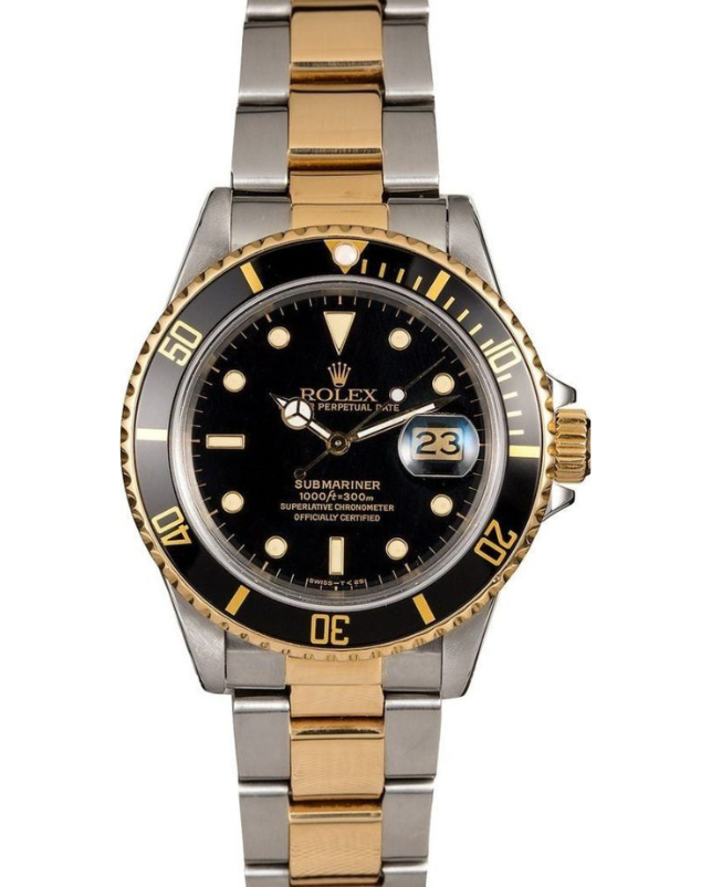 Two-tone Rolex Submariner watch with black dial and bezel, showing date at 3 o’clock
