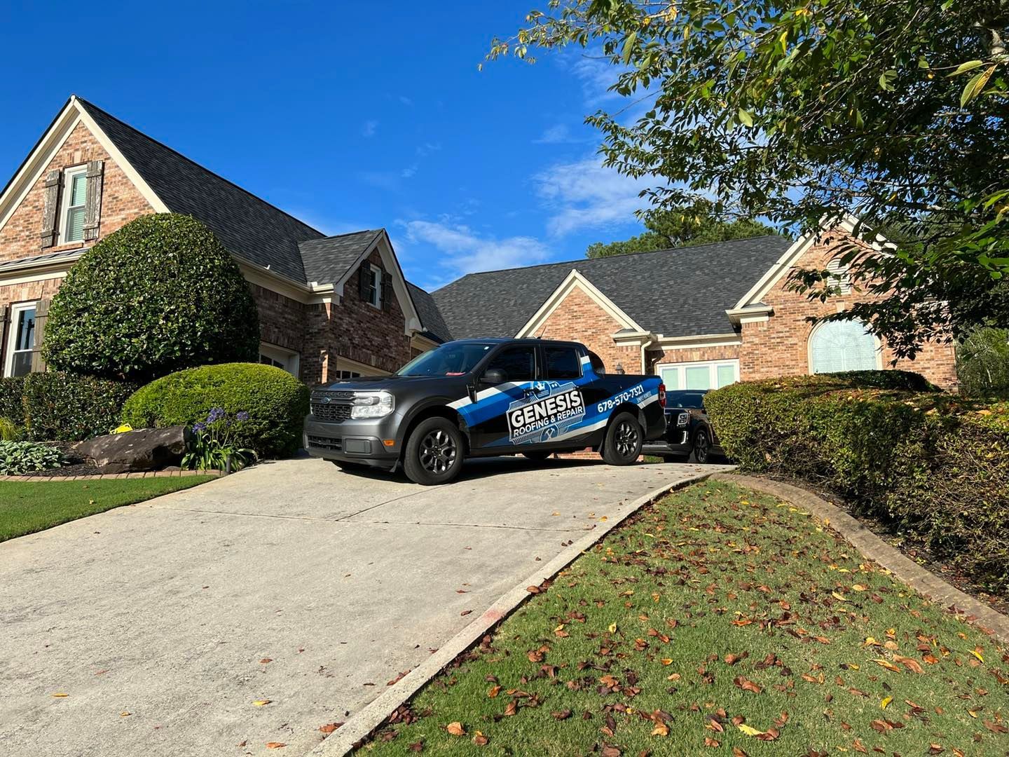 Skilled roofing professional from Genesis Roofing and Repair performing an inspection on a Buford, GA home, providing expert roof repair and replacement services.