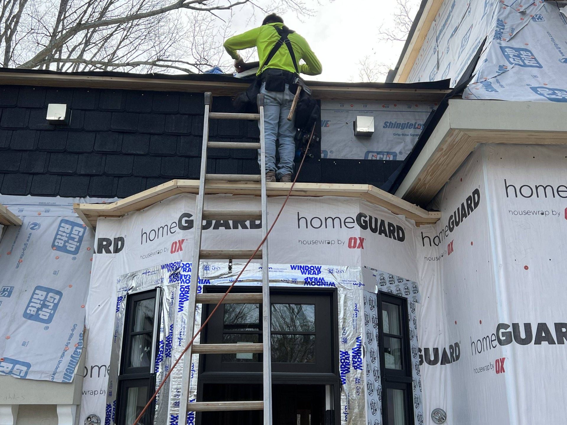 Professional roof repair service inspecting and repairing storm-damaged shingles and roof leaks to restore long-term protection.
