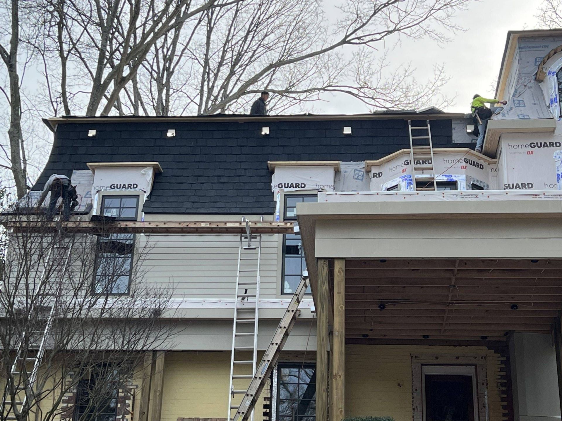 Full roof replacement in progress with new roofing materials installed for long-term durability and performance.