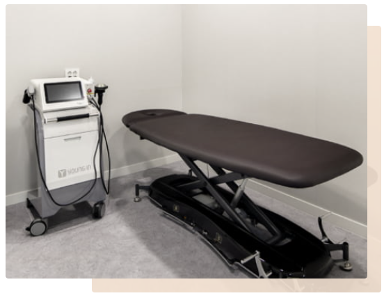 Treatment room with shockwave therapy equipment