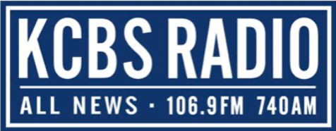 A blue sign that says kcbs radio on it