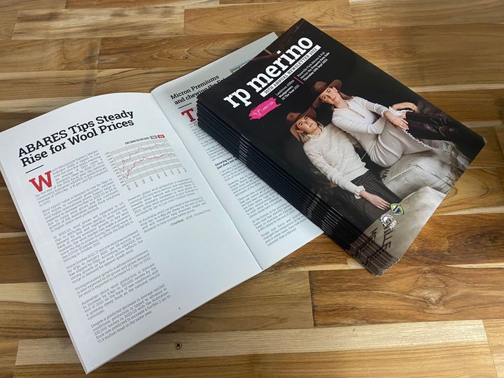 Man Holding A Business Bi-Fold Brochure — Printing in Dubbo, NSW