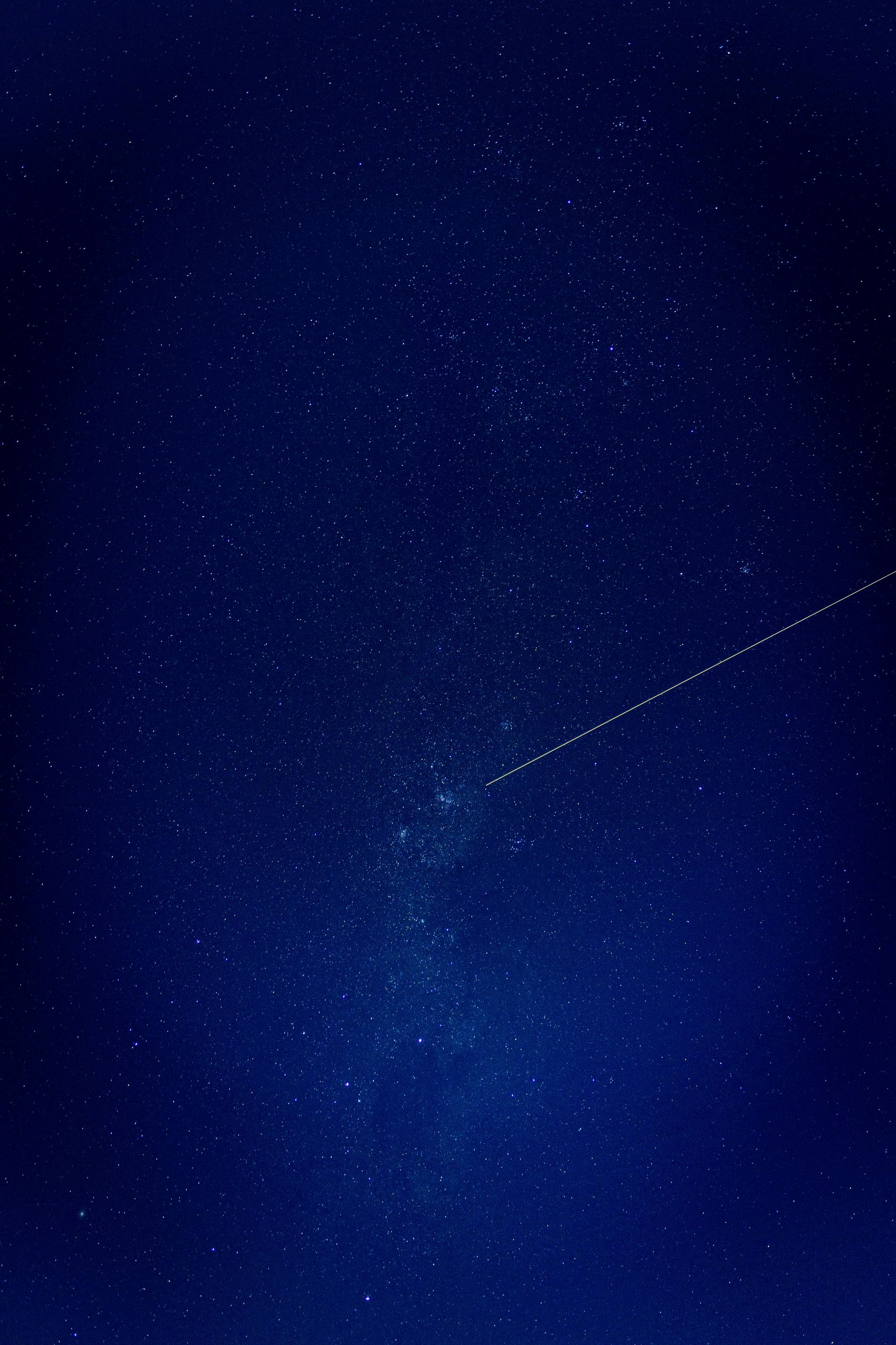 A dark blue sky filled with lots of stars