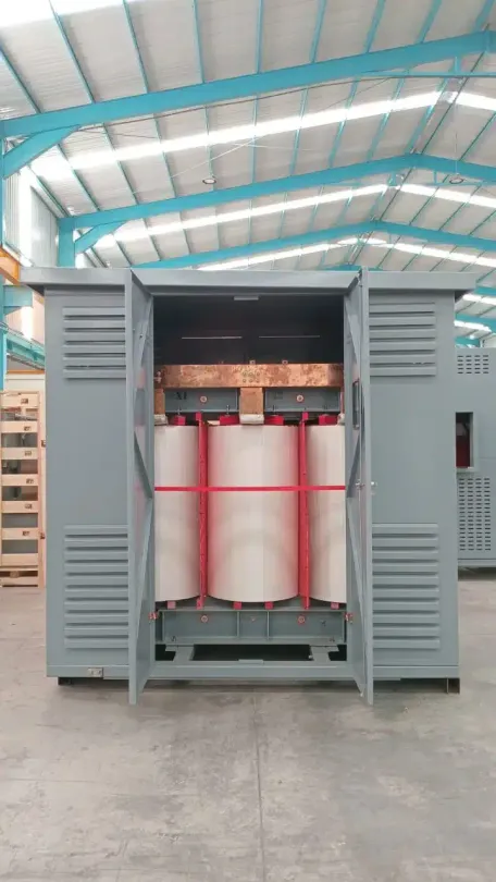 Large industrial electrical cabinet with open doors, showing three white-and-red power units inside a warehouse.